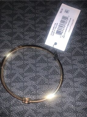 Coach Gold-Tone Knot Bangle Bracelet